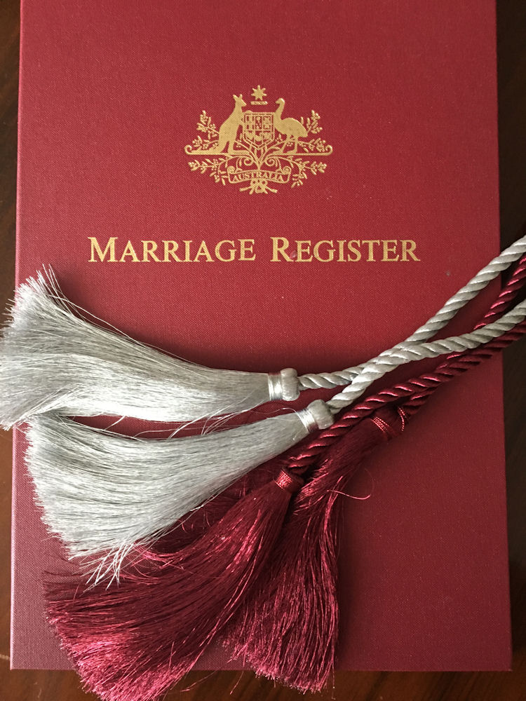 Handfasting cords on marriage register